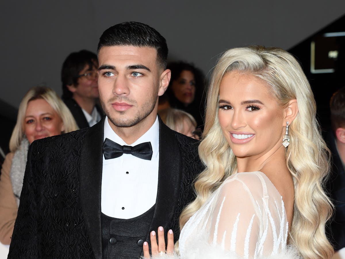 Tommy Fury and Molly-Mae arrive home in lavish £5k designer togs