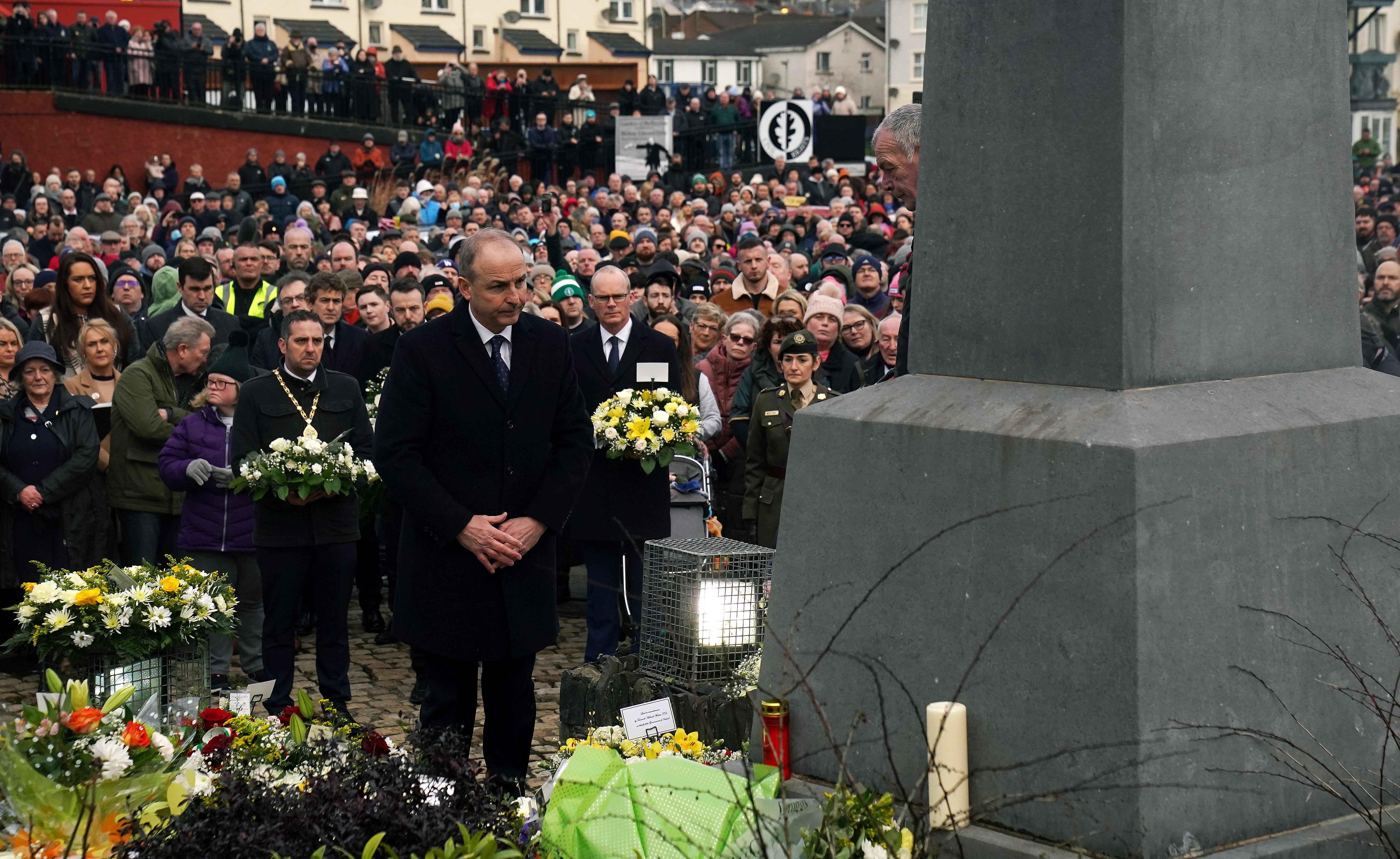 Taoiseach Micheal Martin lays a wreath during a ceremony at the Bloody Sunday Memorial (Brian Lawless/PA)