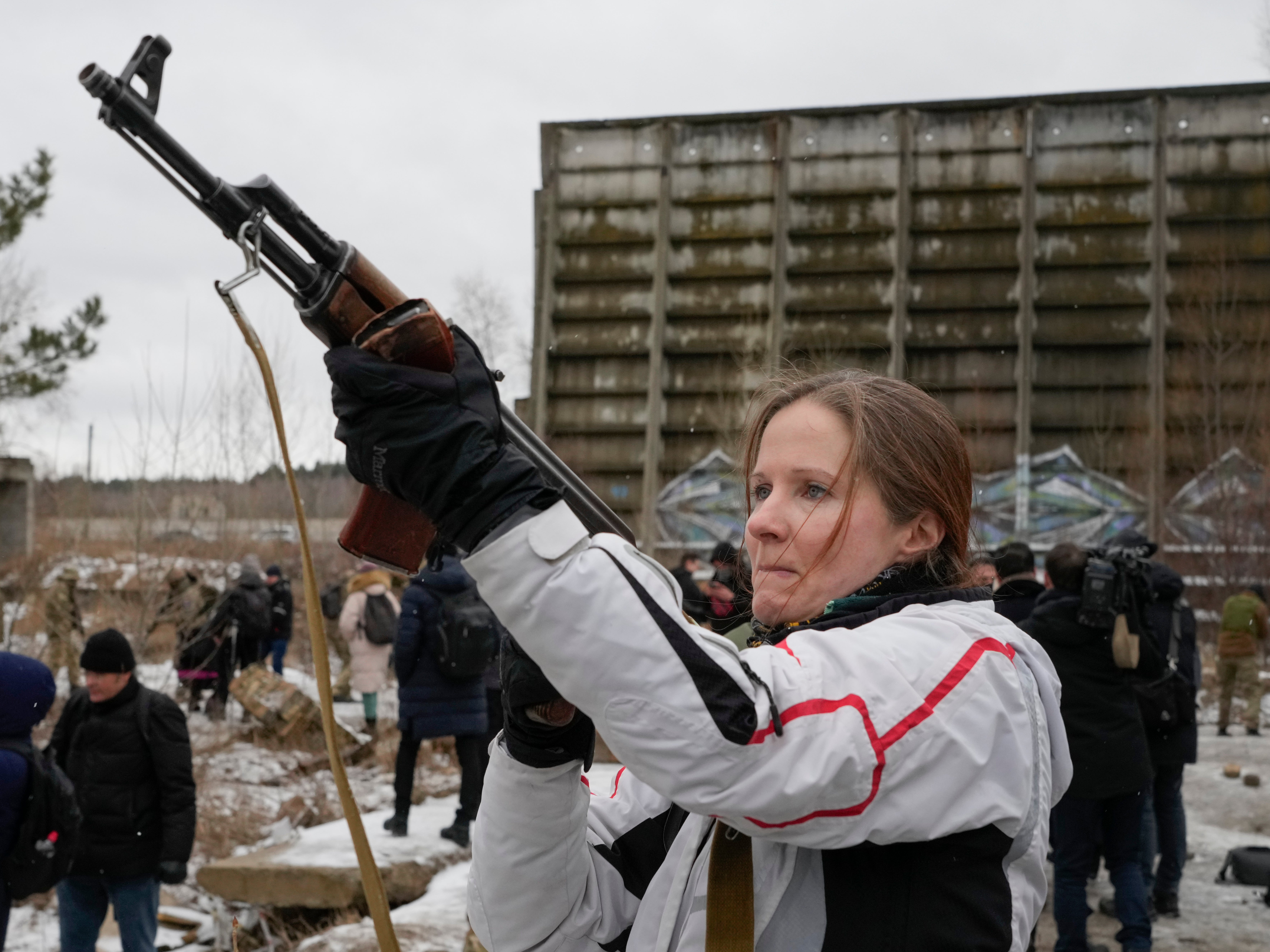 Members of Ukraine’s Territorial Defence Force, volunteer military units of the armed forces, train close to Kiev