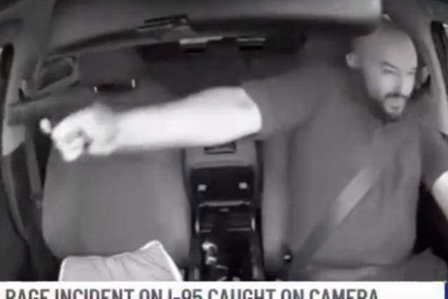 <p>Dashboard camera video shows a man firing a pistol at a fellow driver in Miami.</p>