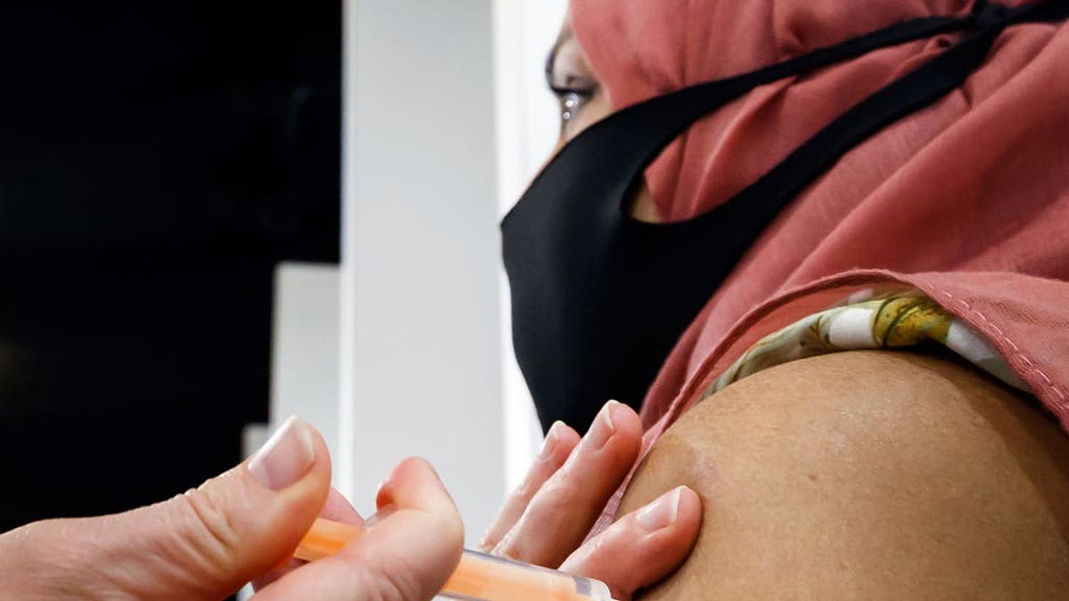 &lsquo;Alarming&rsquo; racial inequality in booster vaccinations, charity says