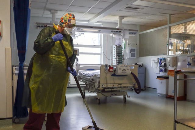 File photo dated 27/5/2020 of a cleaner working on a hospital ward (Steve Parsons/PA)