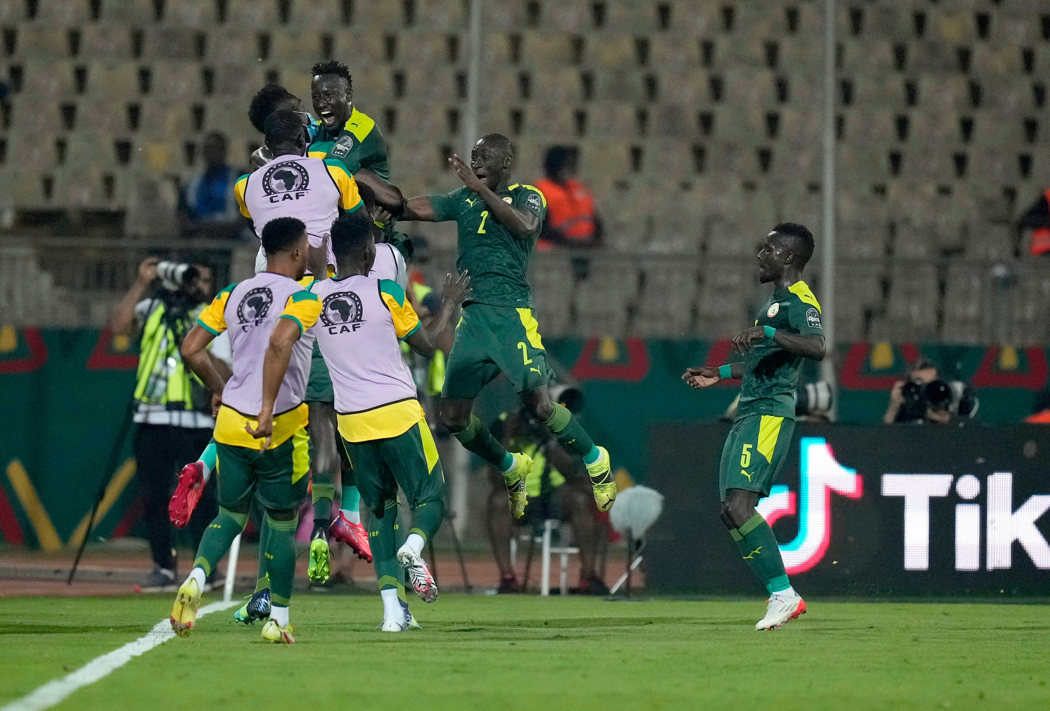 Senegal players celebrate during their 3-1 victory over Equatorial Guinea, which secured a semi-final spot at the African Cup of Nations (Themba Hadebe/PA)