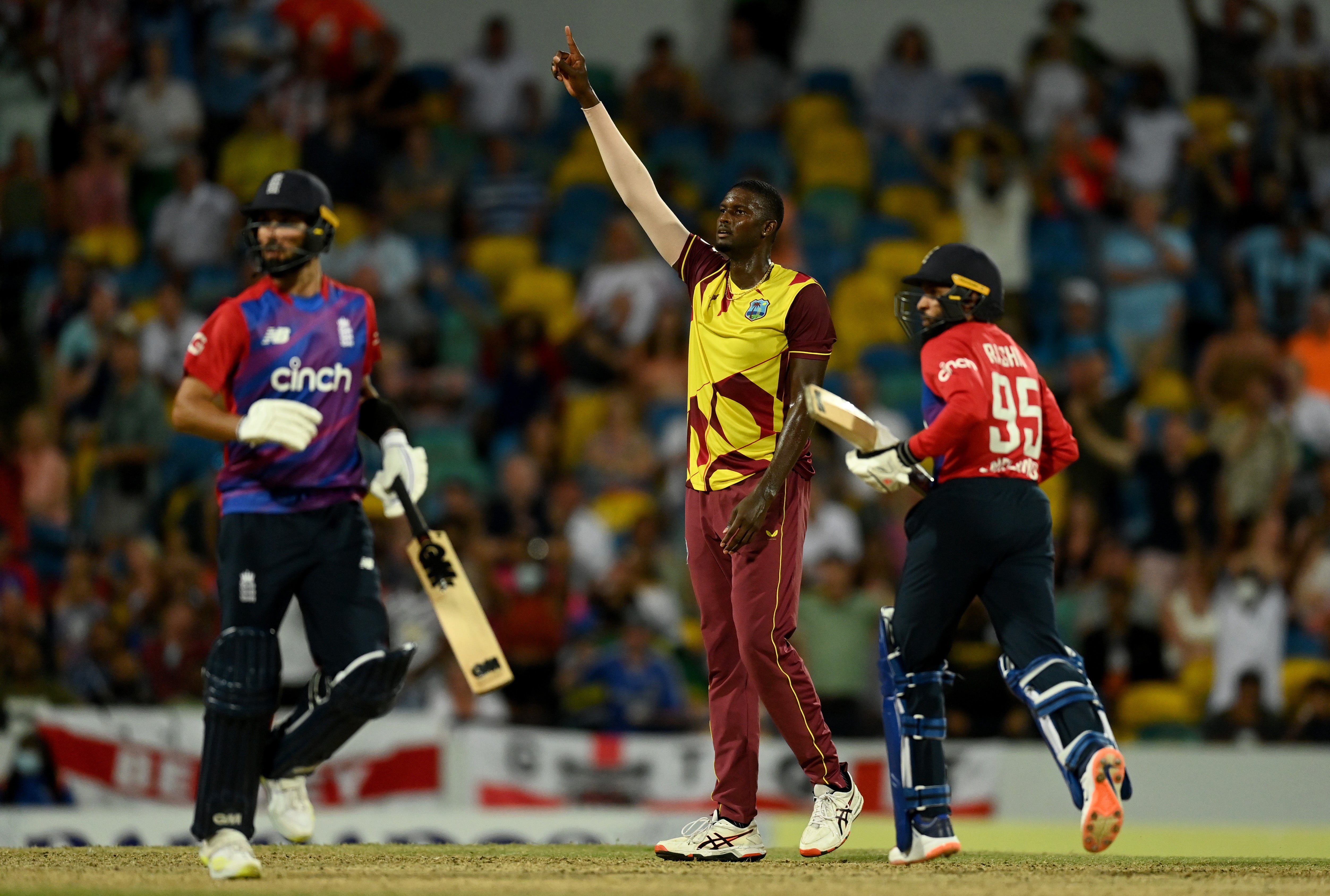 Jason Holder of the West Indies celebrates dismissing Adil Rashid of England