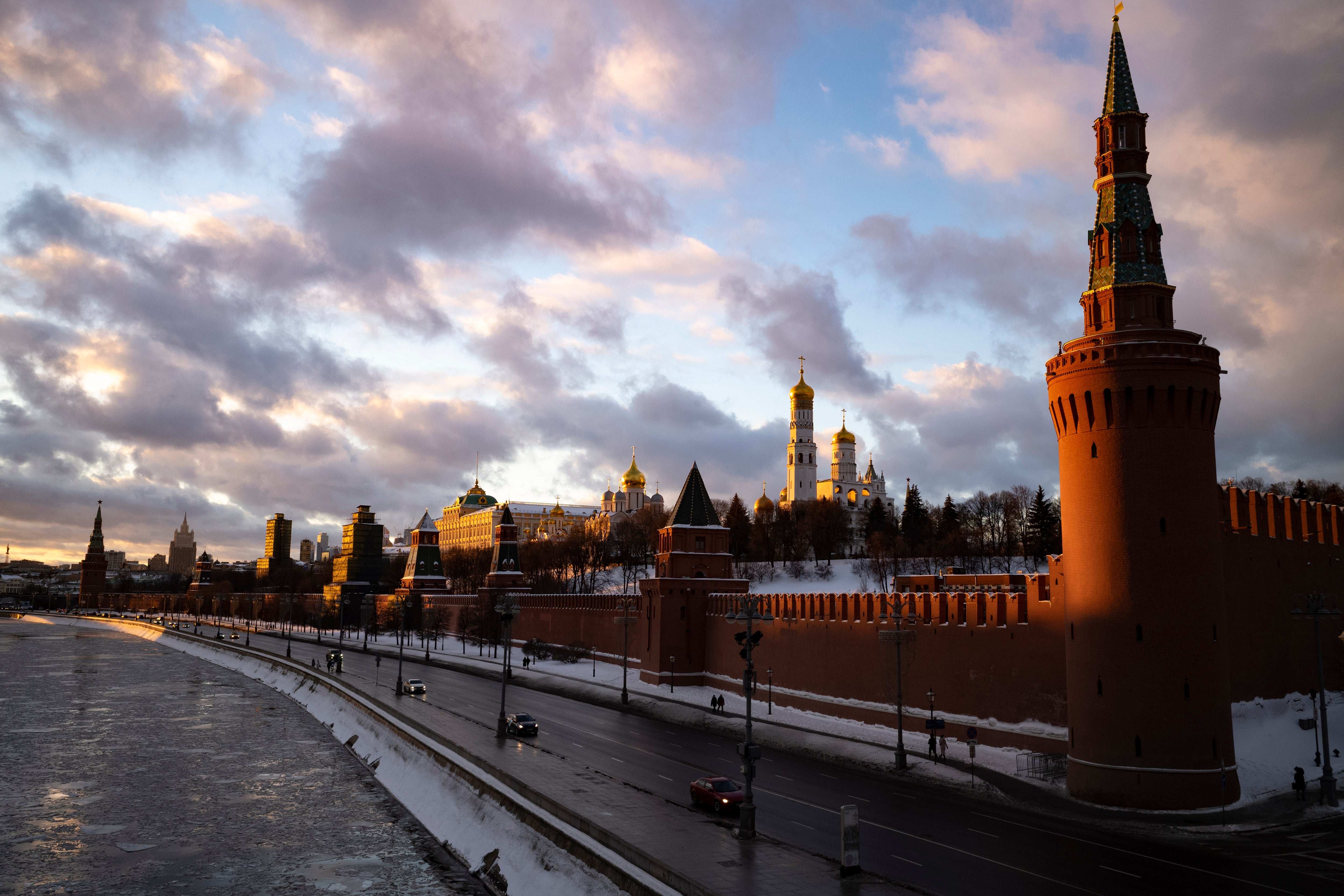 Sunset over the Kremlin and frozen Moscow River