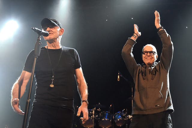 <p>Woody Woodmansey (right) on stage with Tony Visconti in 2016</p>