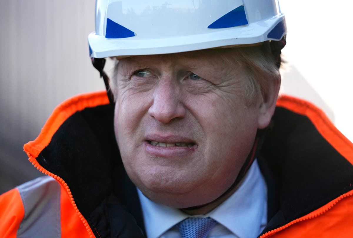 Boris Johnson tries to change subject from 'partygate' woes