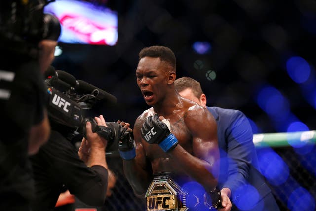 <p>Israel Adesanya after taking the UFC middleweight title from Robert Whittaker</p>