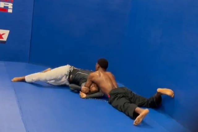 <p>UFC middleweight Kevin Holland submits a ‘troll’ in a sparring session</p>
