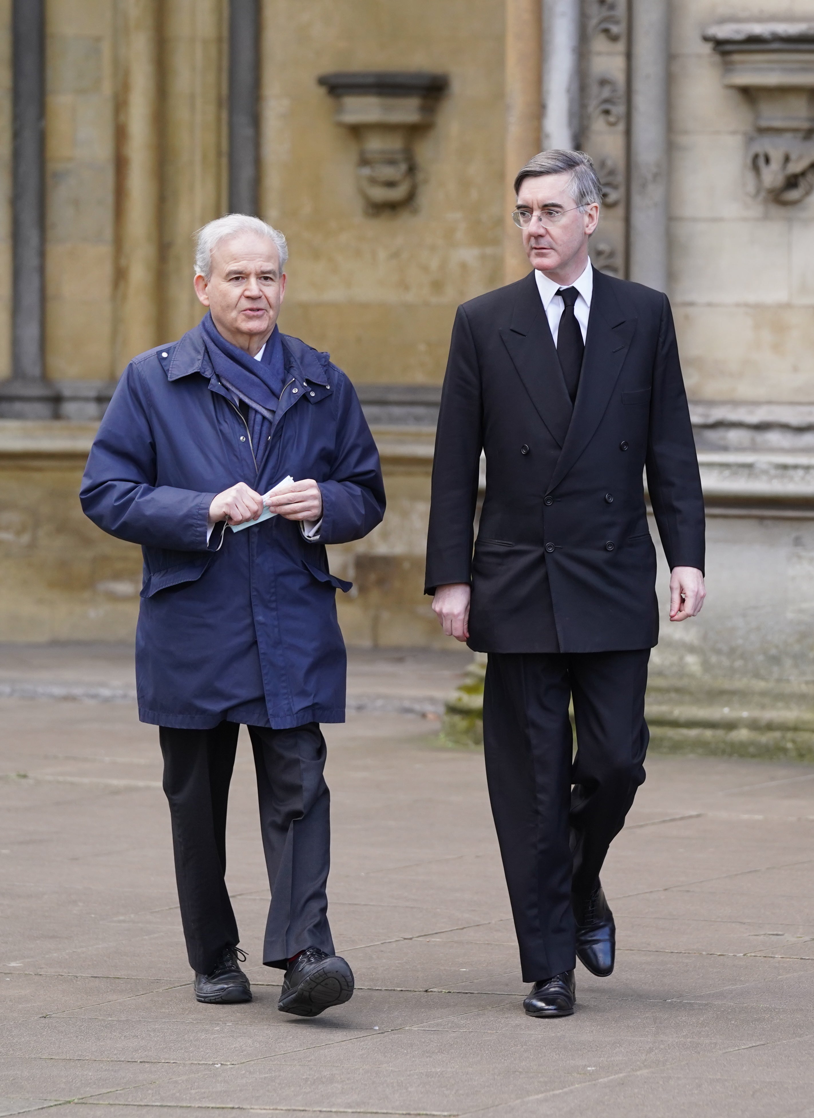 Leader of the House of Commons Jacob Rees-Mogg (right) arrives for the funeral (Stefan Rousseau/PA)