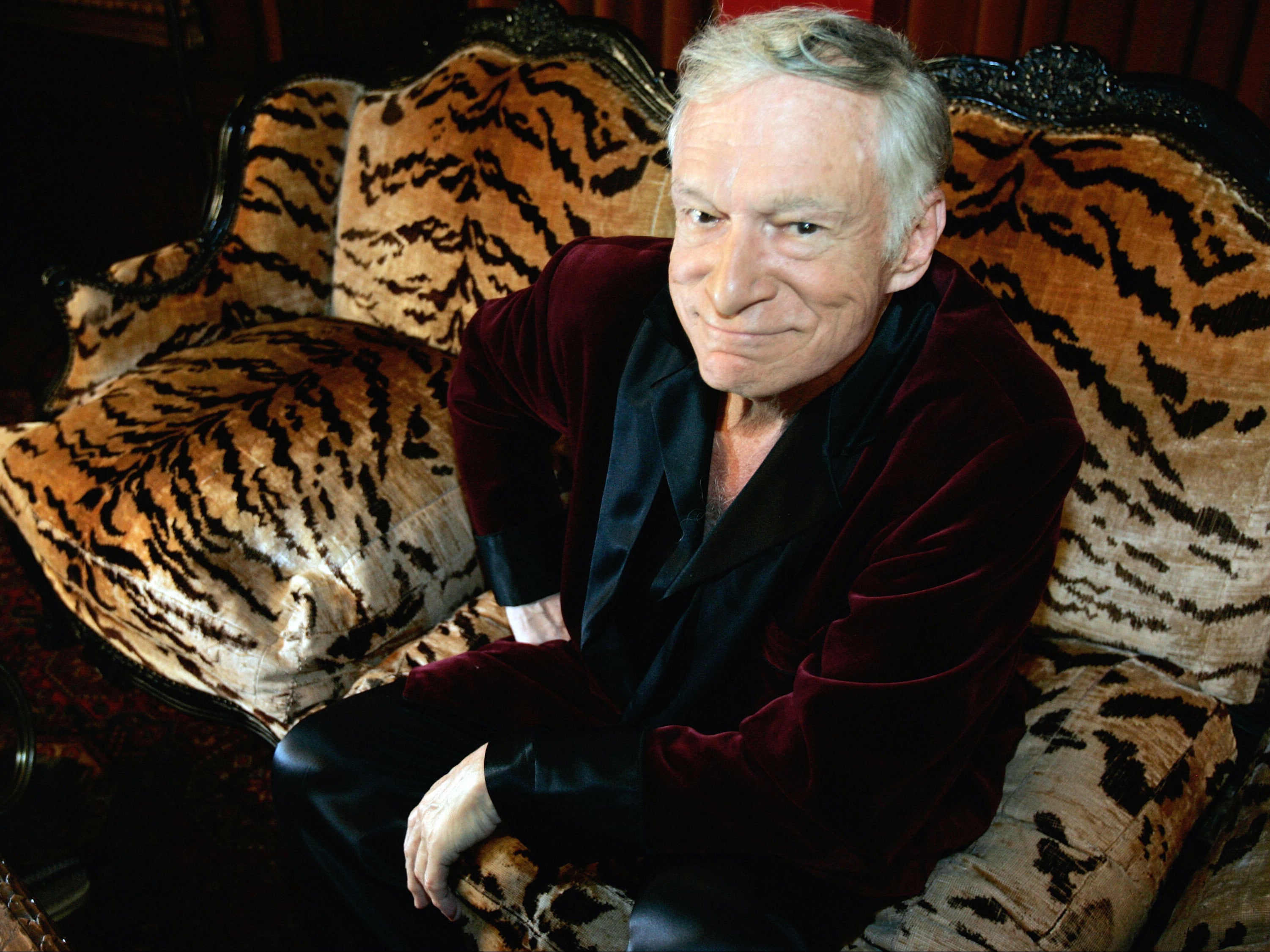 Hugh Hefner poses for a photo during an interview with journalists at his mansion in Los Angeles, California, on 23 August 2006