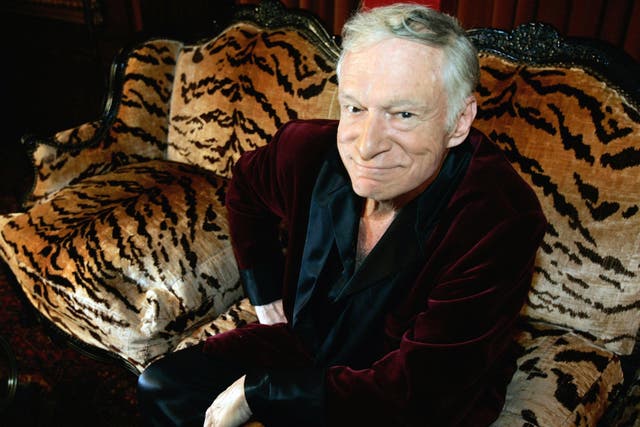 <p>Hugh Hefner poses for a photo during an interview with journalists at his mansion in Los Angeles, California, on 23 August 2006</p>