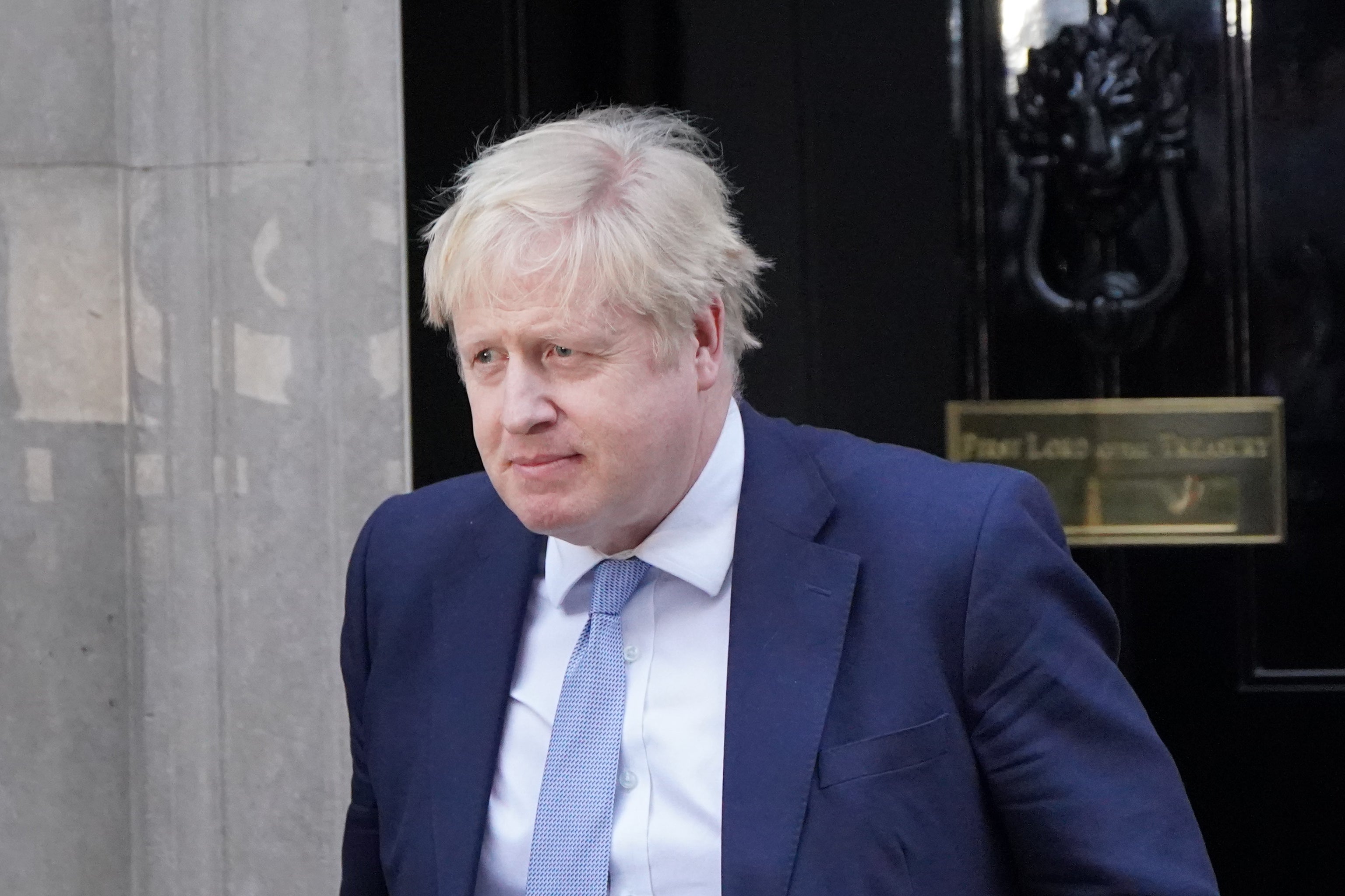 Prime Minister Boris Johnson leaves 10 Downing Street for the House of Commons, where he will make a statement to MPs on the Sue Gray report. (Jonathan Brady/PA)
