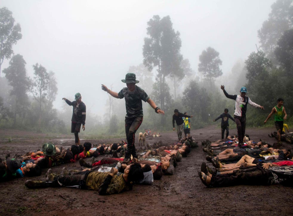 <p>In this file photo taken on 16 October 2021, members of the Karenni Nationalities Defence Force take part in training at their base camp in the forest near Demoso in Kayah</p>