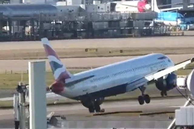 <p>BA plane tips over in the wind</p>