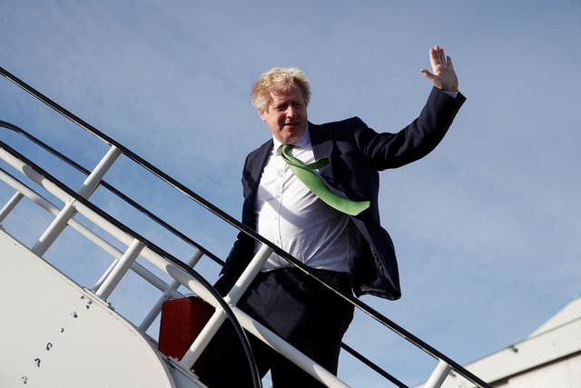 Prime Minister Boris Johnson boards an aircraft in London for a flight to Kyiv, Ukraine (Peter Nicholls/PA)