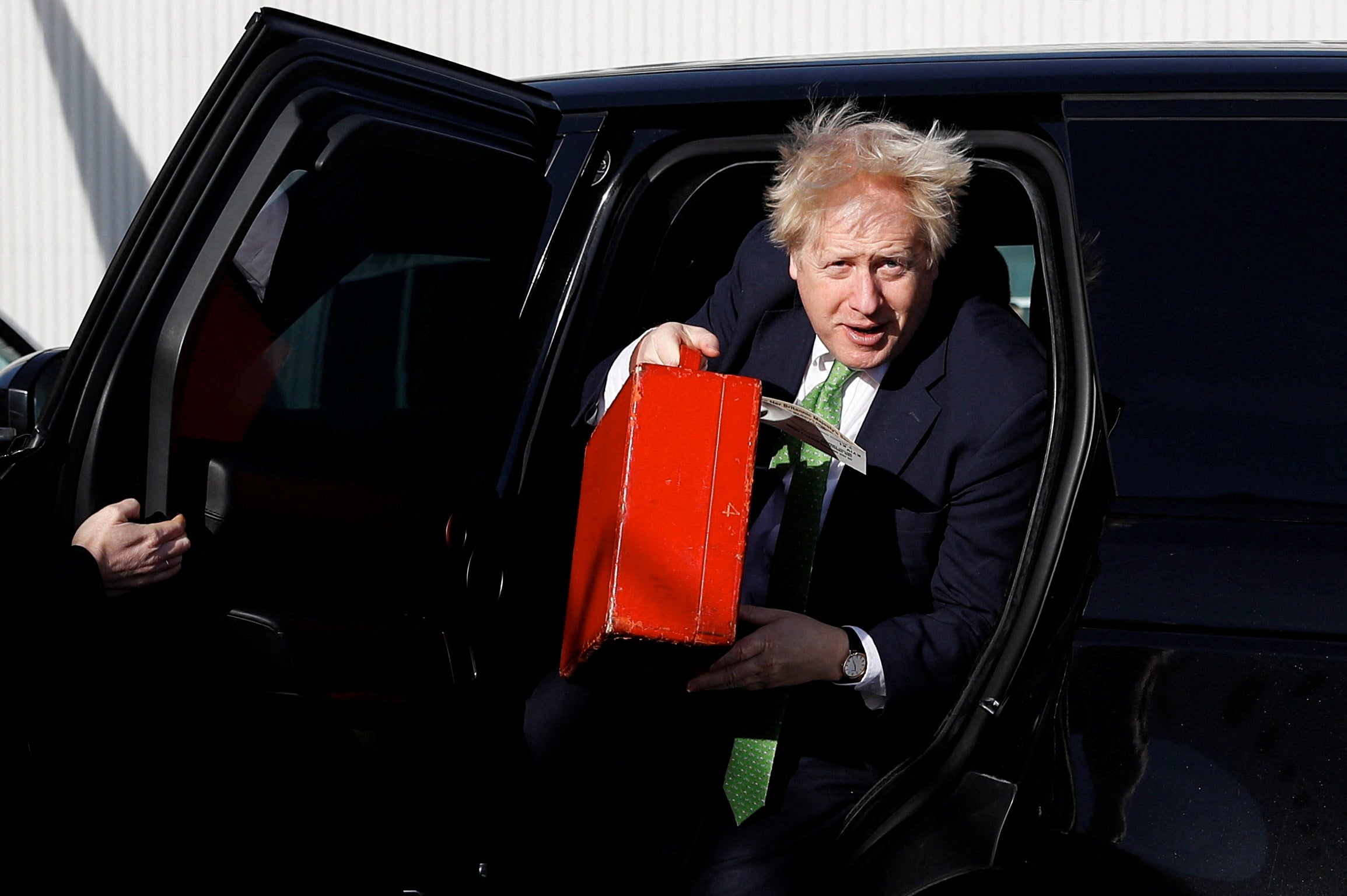 Boris Johnson arrives to board an aircraft in London for a flight to Kiev, Ukraine