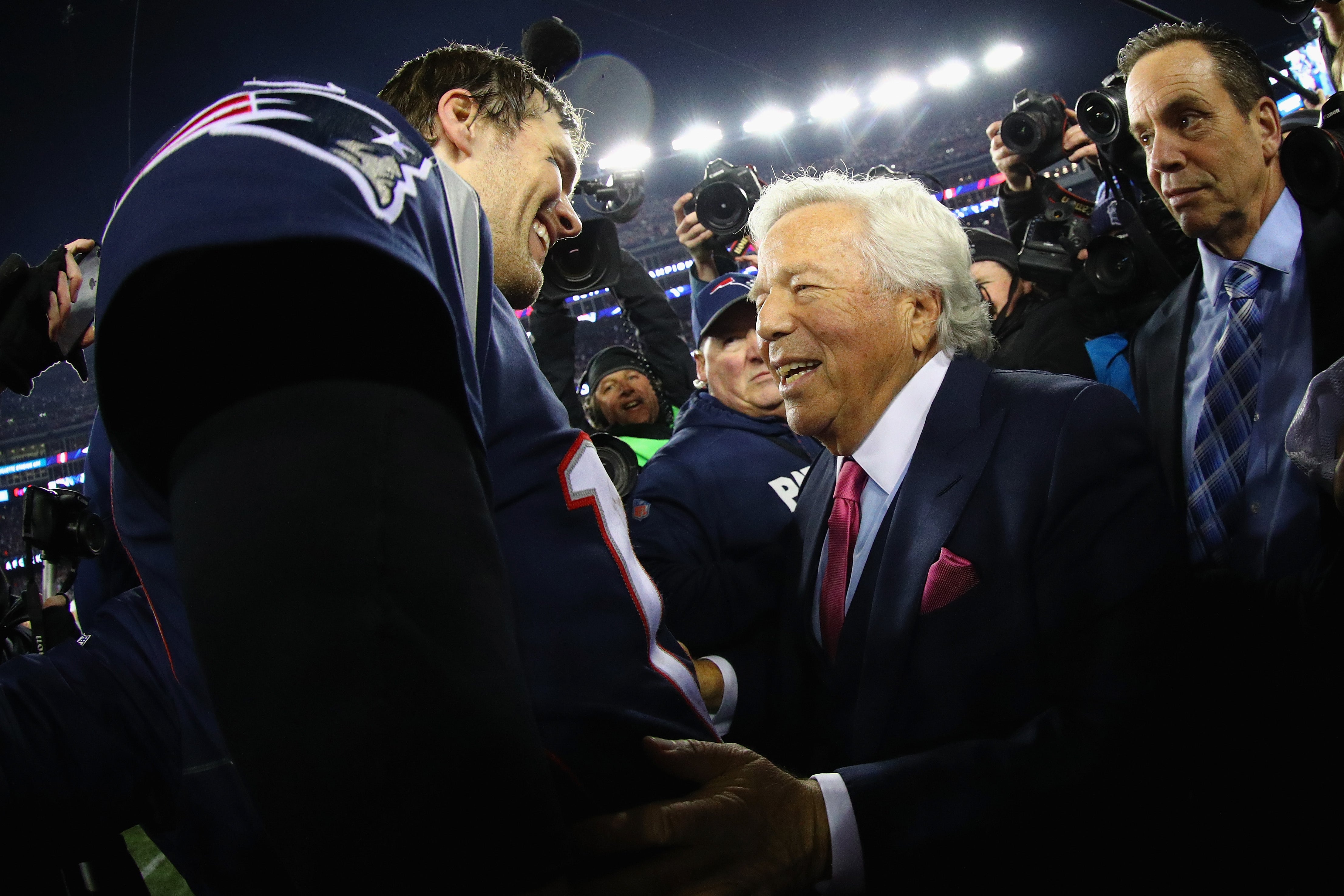 Tom Brady celebrates with Patriots owner Robert Kraft after winning the AFC Championship Game against the Jacksonville Jaguars at Gillette Stadium on 21 January 2018