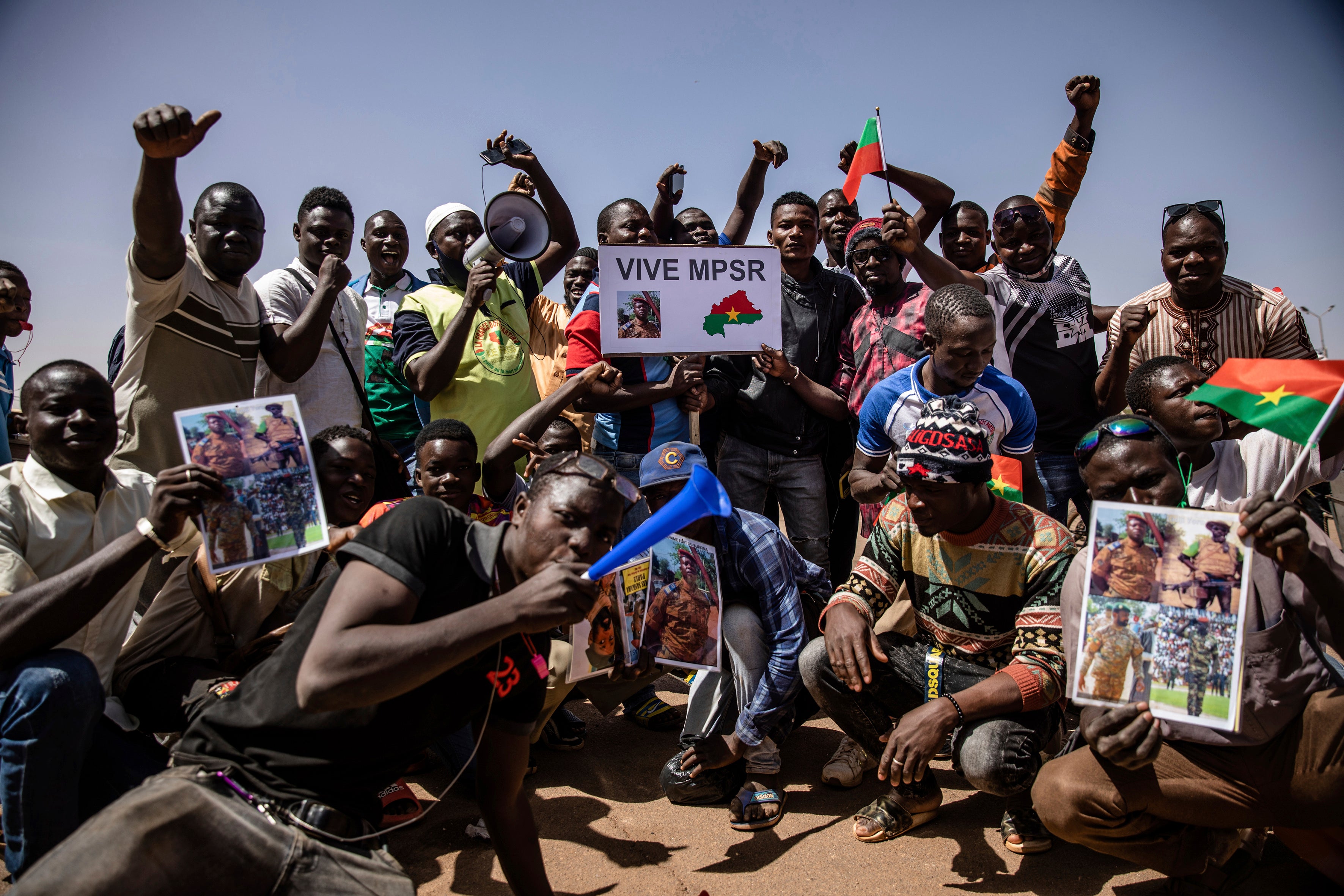 People take to the streets of Ouagadougou to rally in support of the new military junta