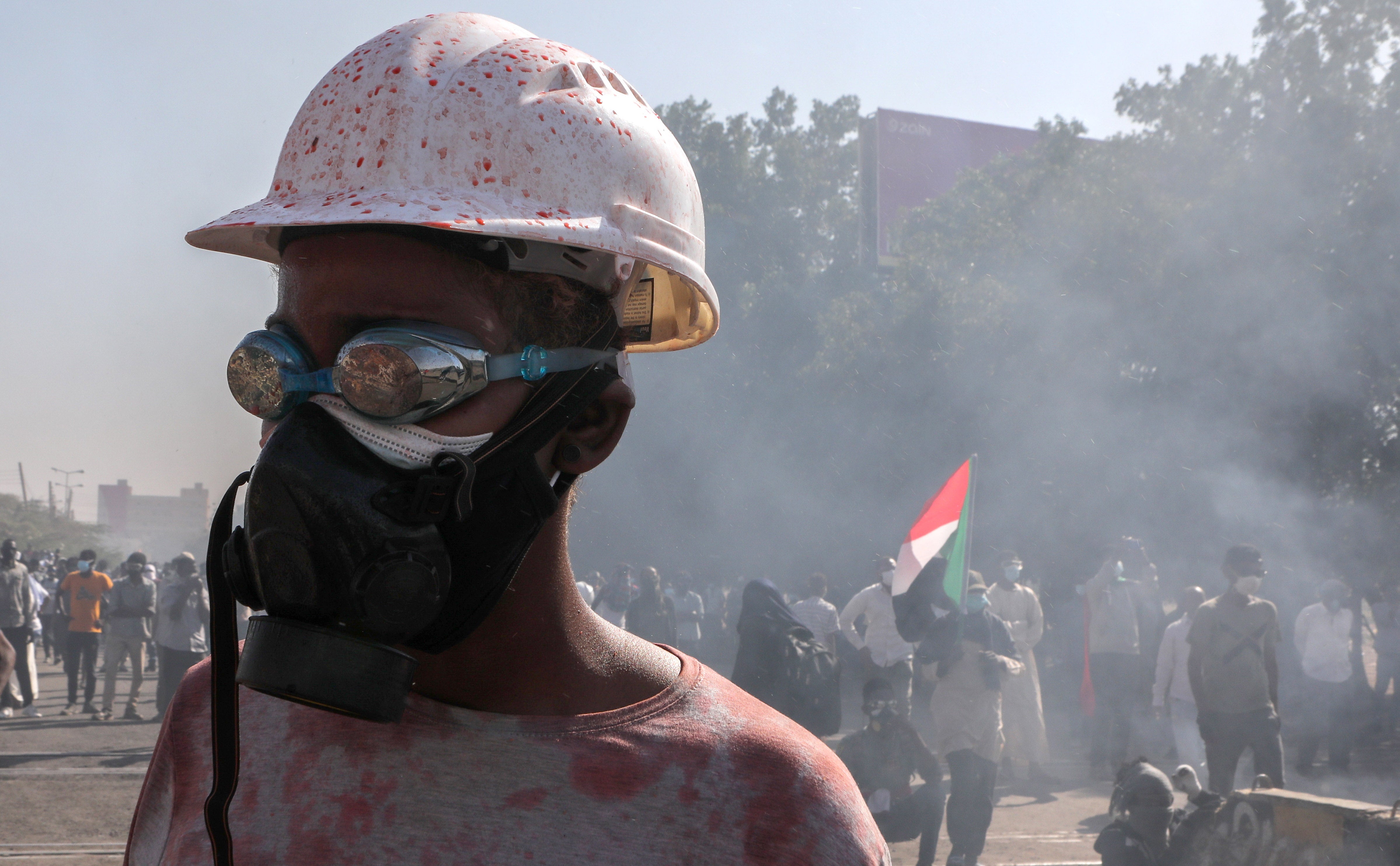 Sudanese protesters clash with security forces during a protest against military coup, in Khartoum, last month