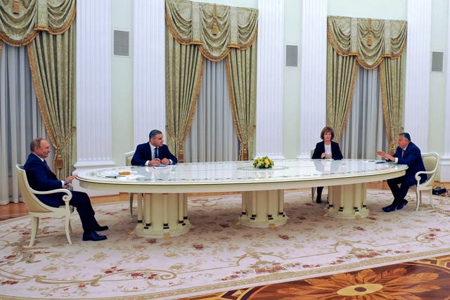 <p>Russian President Vladimir Putin, left, listens to Hungary’s Prime Minister Viktor Orban during their meeting in the Kremlin</p>