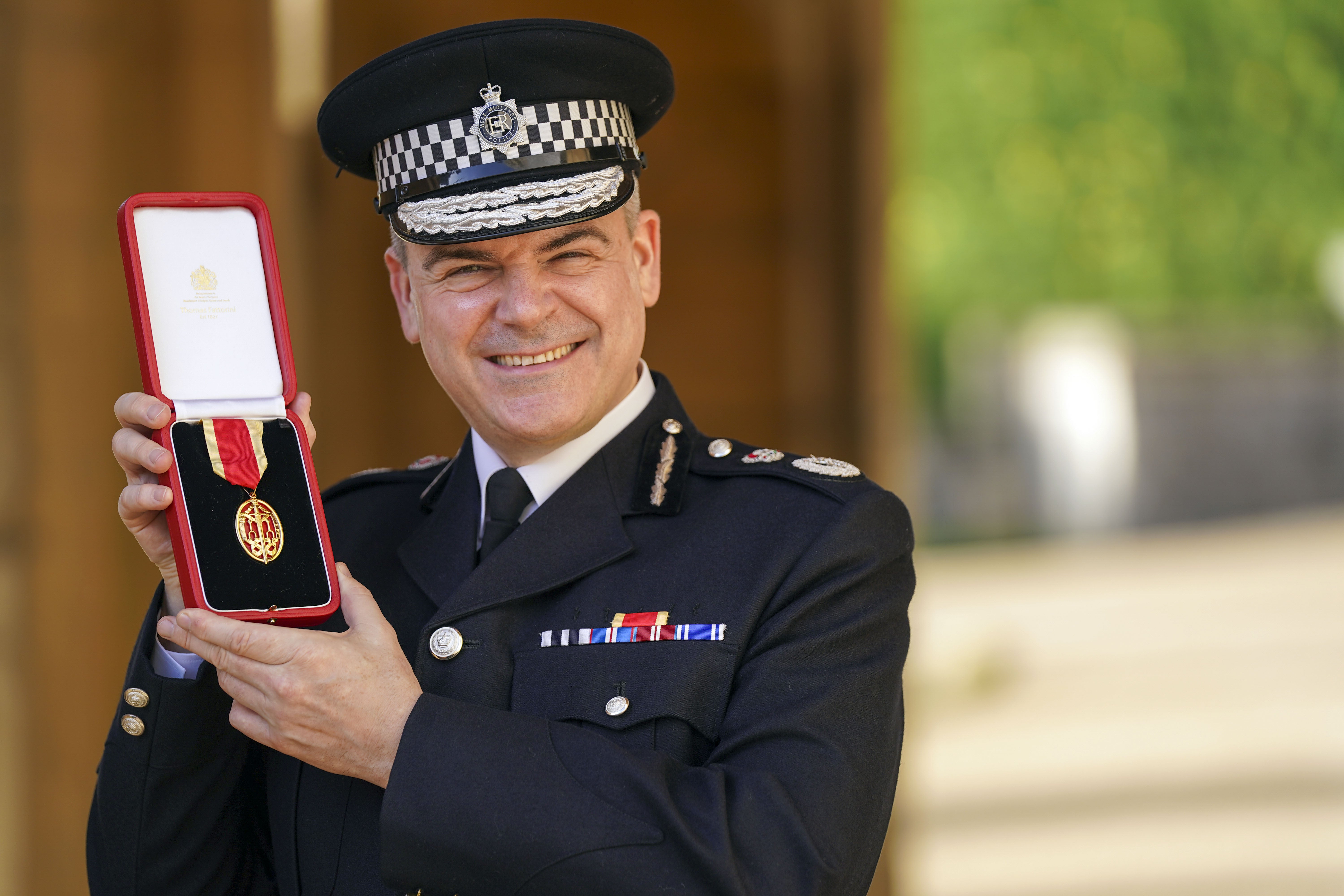 Sir David Thompson, Chief Constable of West Midlands Police, after being made a Knight Bachelor by the Prince of Wales at Windsor Castle (Steve Parsons/PA)