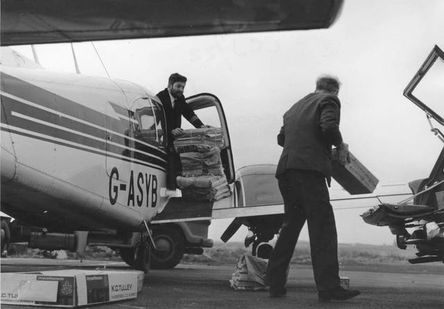 <p>Paper round: newspaper delivery has long been part of the Loganair service</p>