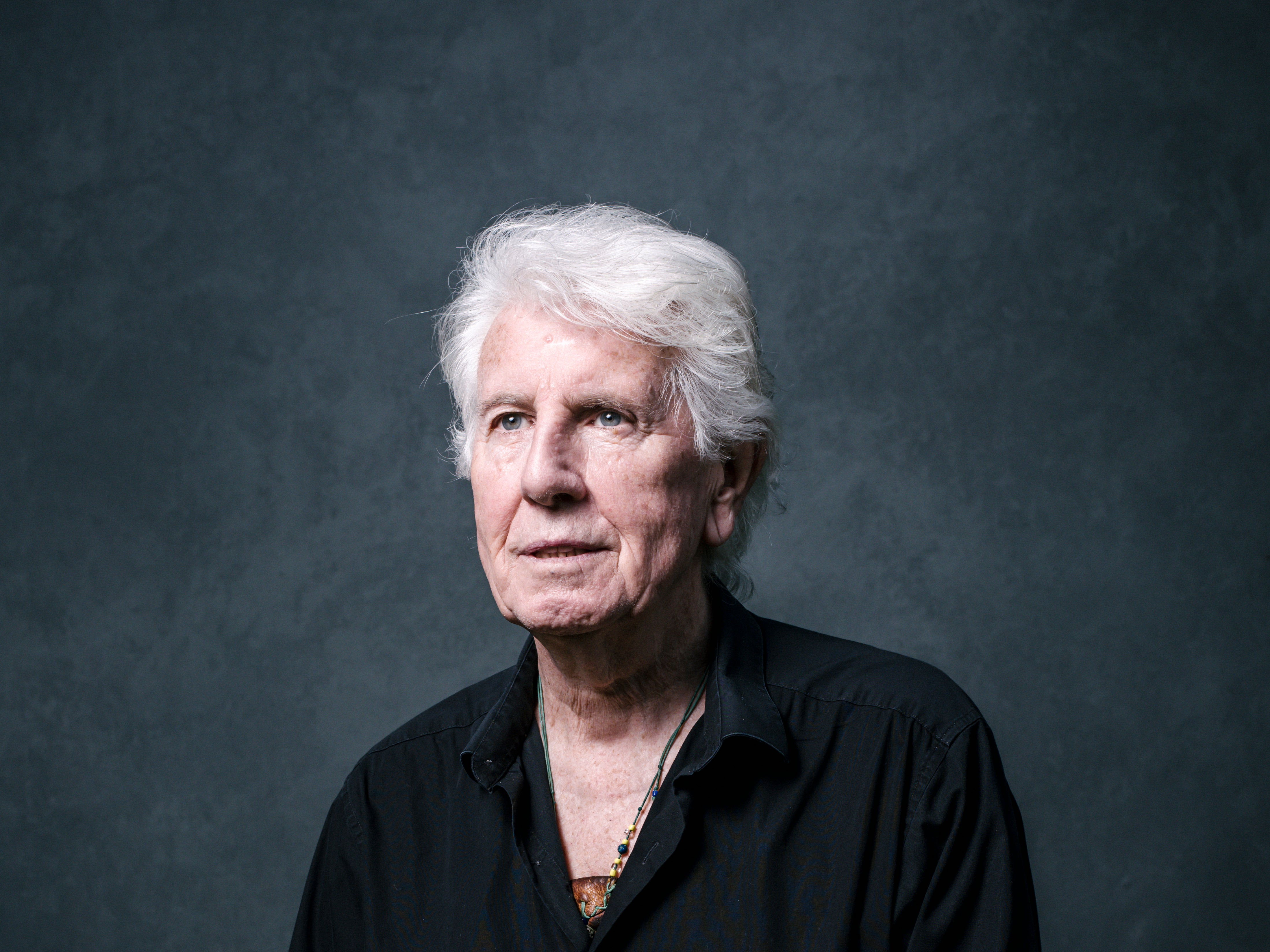 Graham Nash has withdrawn his music from Spotify in protest against podcaster Joe Rogan