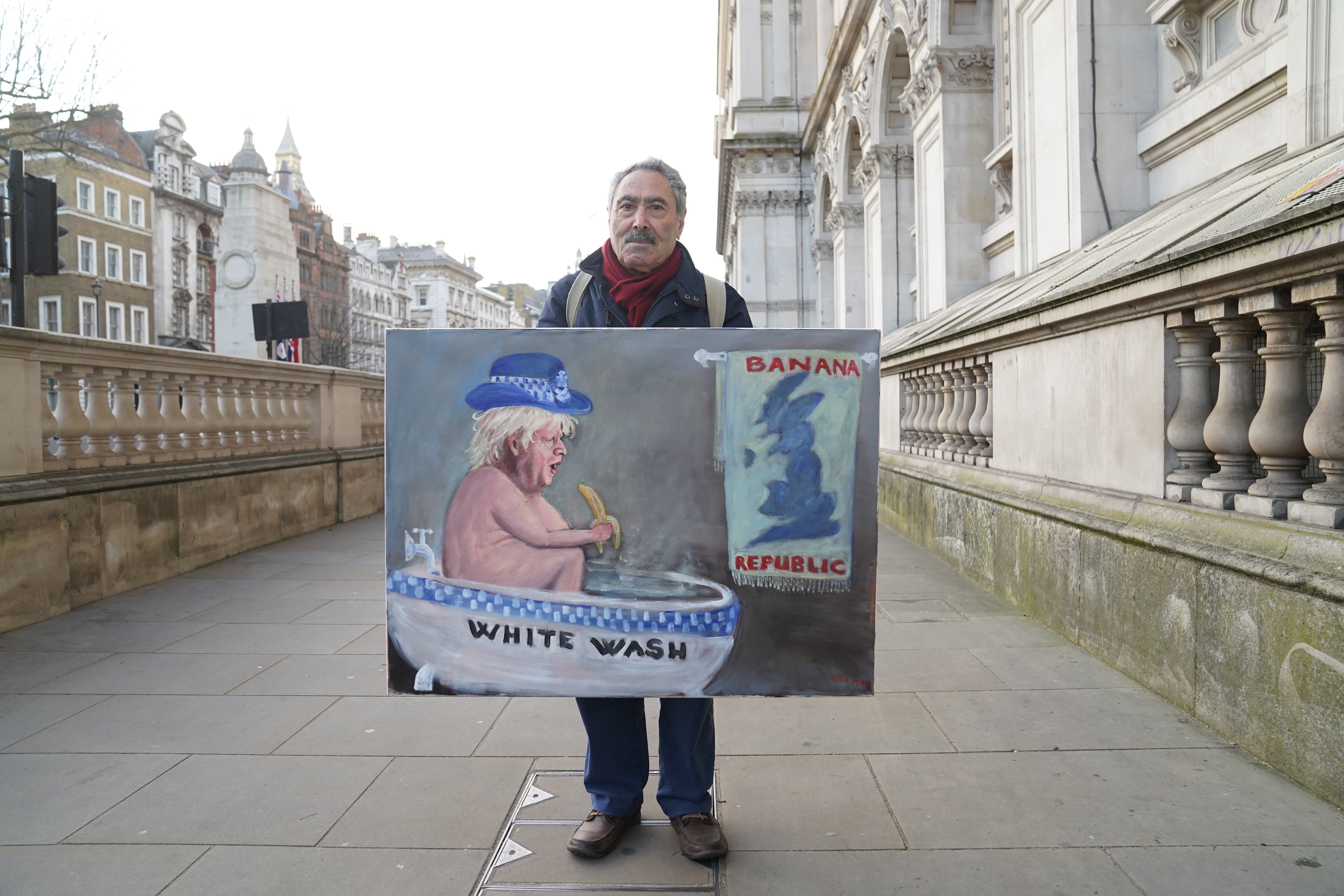 Artist Kaya Mar with his latest painting in Whitehall (Stefan Rousseau/PA)