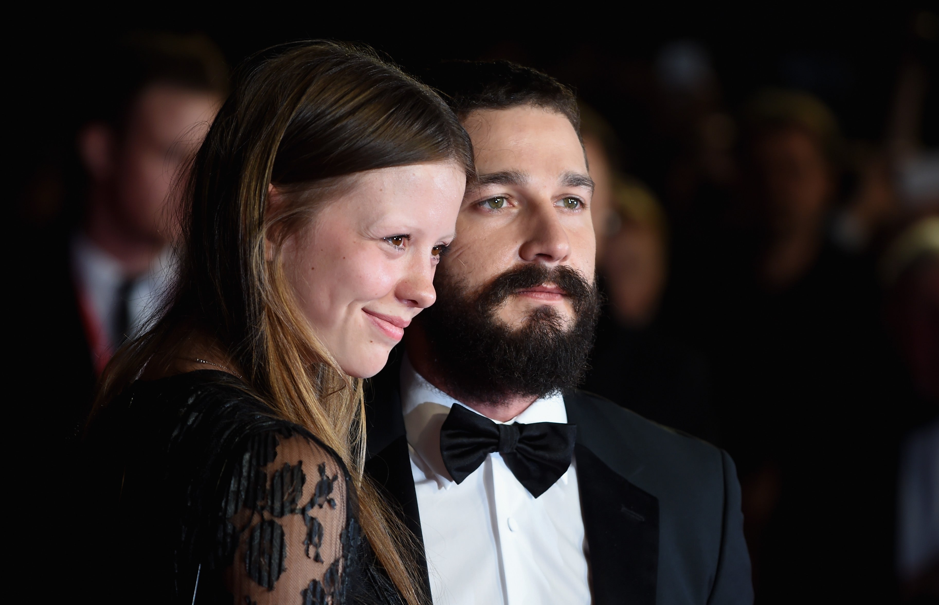 Mia Goth and actor Shia LeBeouf attend the closing night European Premiere gala red carpet arrivals for "Fury" during the 58th BFI London Film Festival at Odeon Leicester Square on October 19, 2014 in London, England