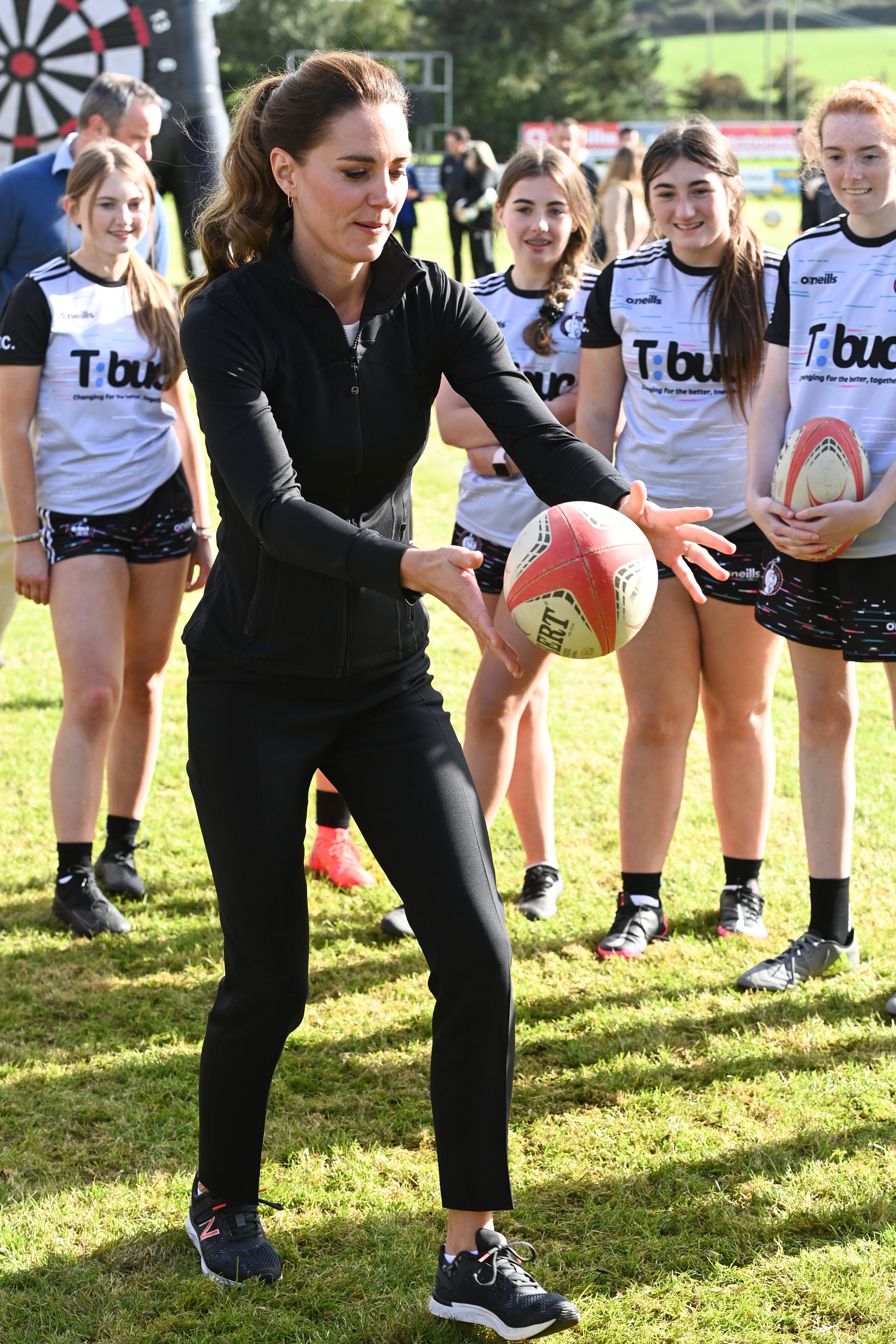 The Duchess of Cambridge kicking a rugby ball during a visit to the City of Derry rugby club in September (Tim Rooke/PA)
