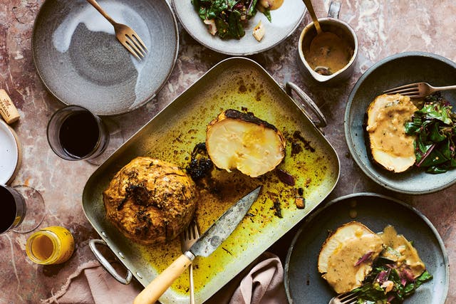 Whole roasted celeriac with mushroom gravy from The Whole Vegetable (Issy Croker/PA)
