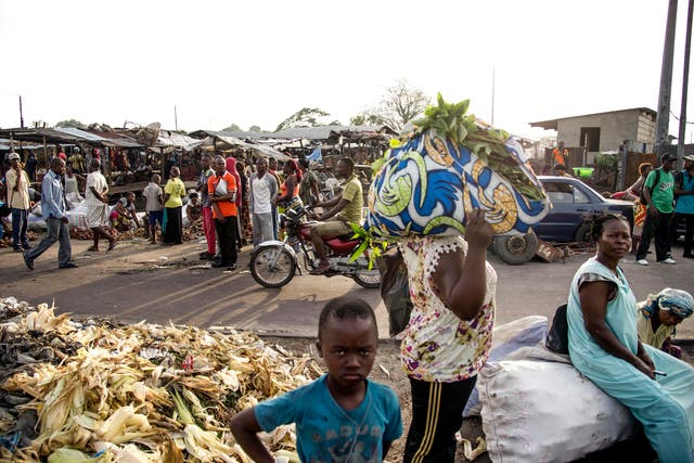 <p>File photo: People stand at the market in Kinshasa, Democratic Republic of Congo, 3 April 2017</p>
