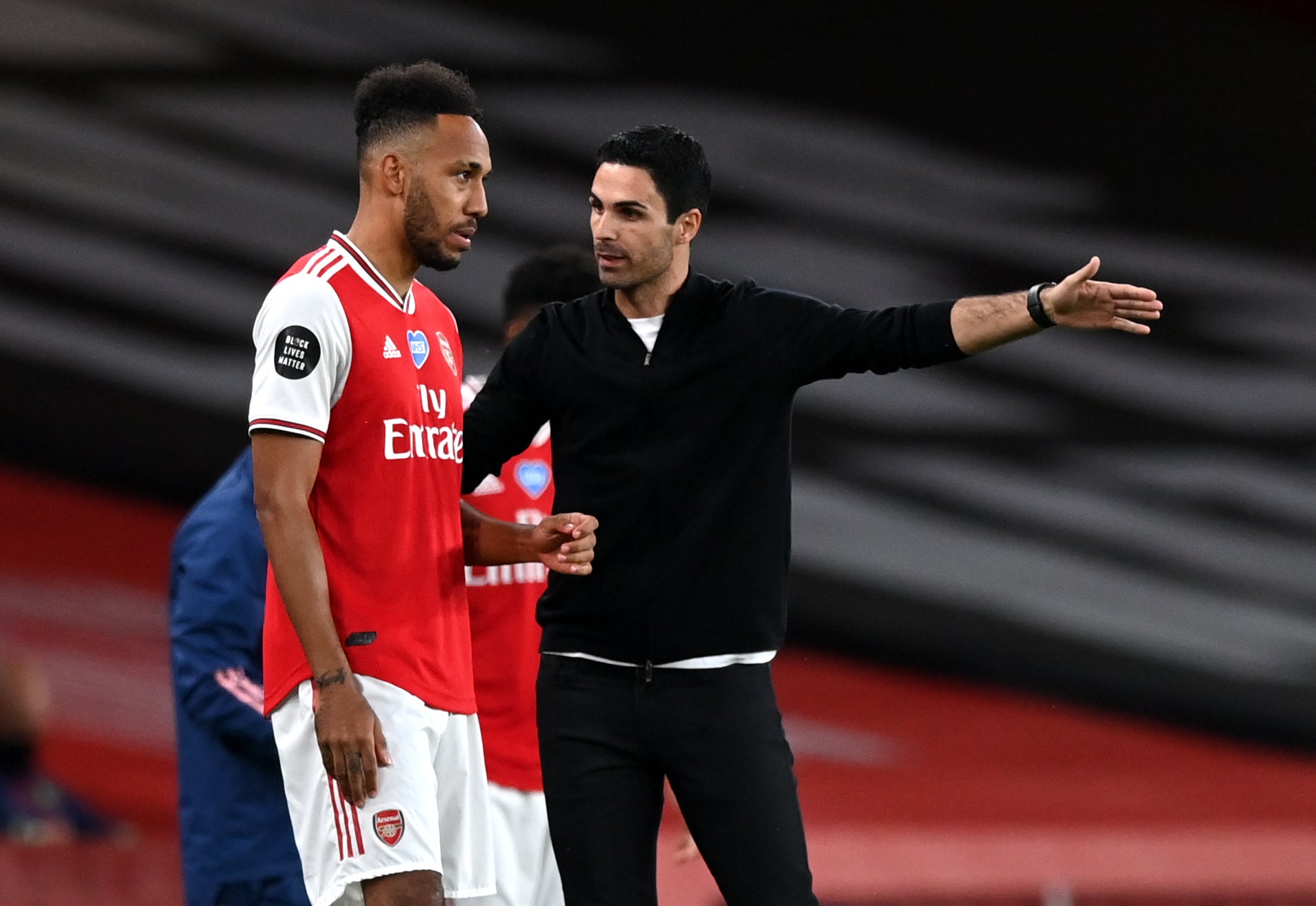 Arsenal manager Mikel Arteta (right) dropped Aubameyang following a disciplinary issue
