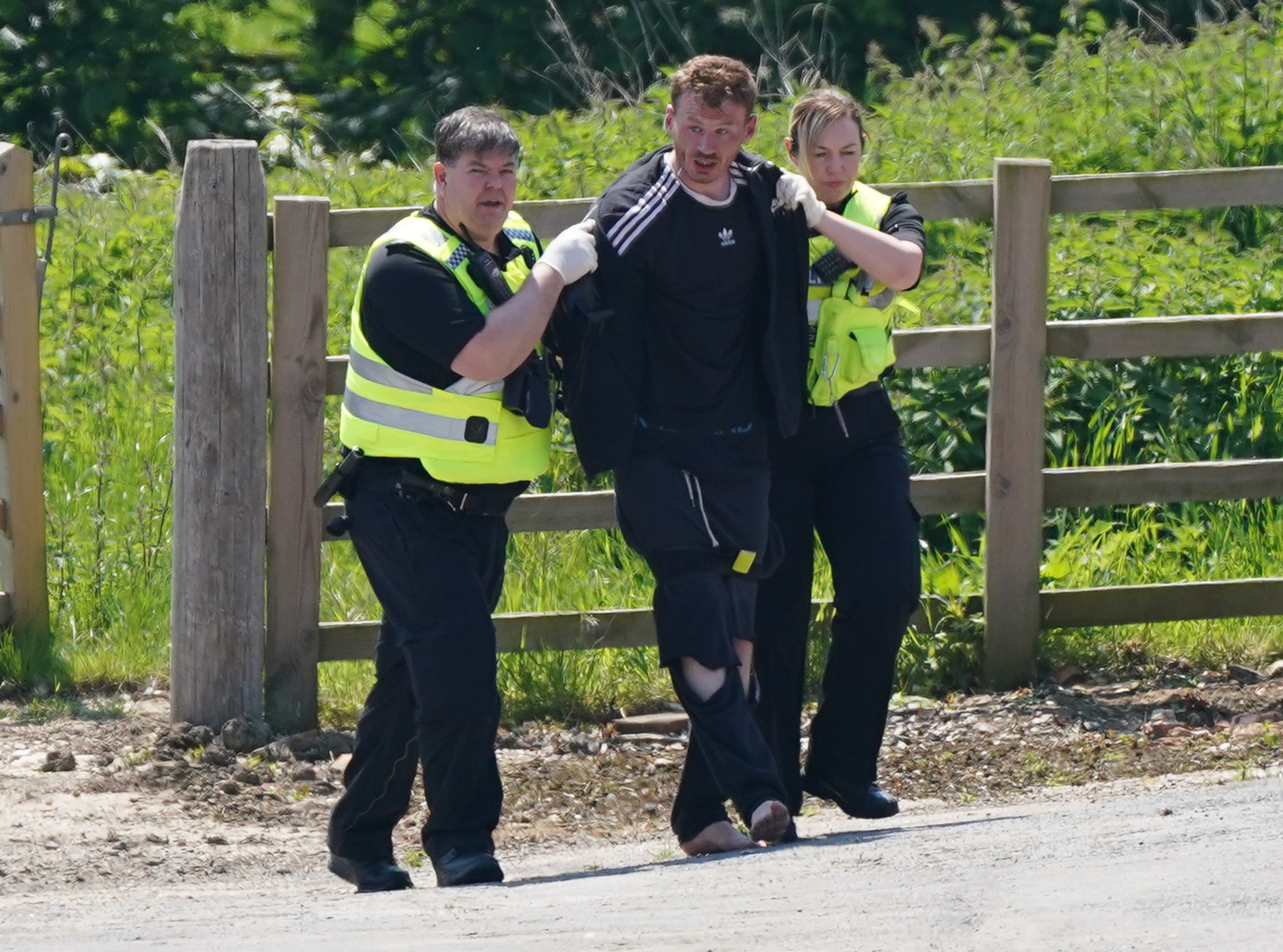 Daniel Boulton being detained at Hallington House Farm, on the outskirts of Louth, Lincolnshire (PA)