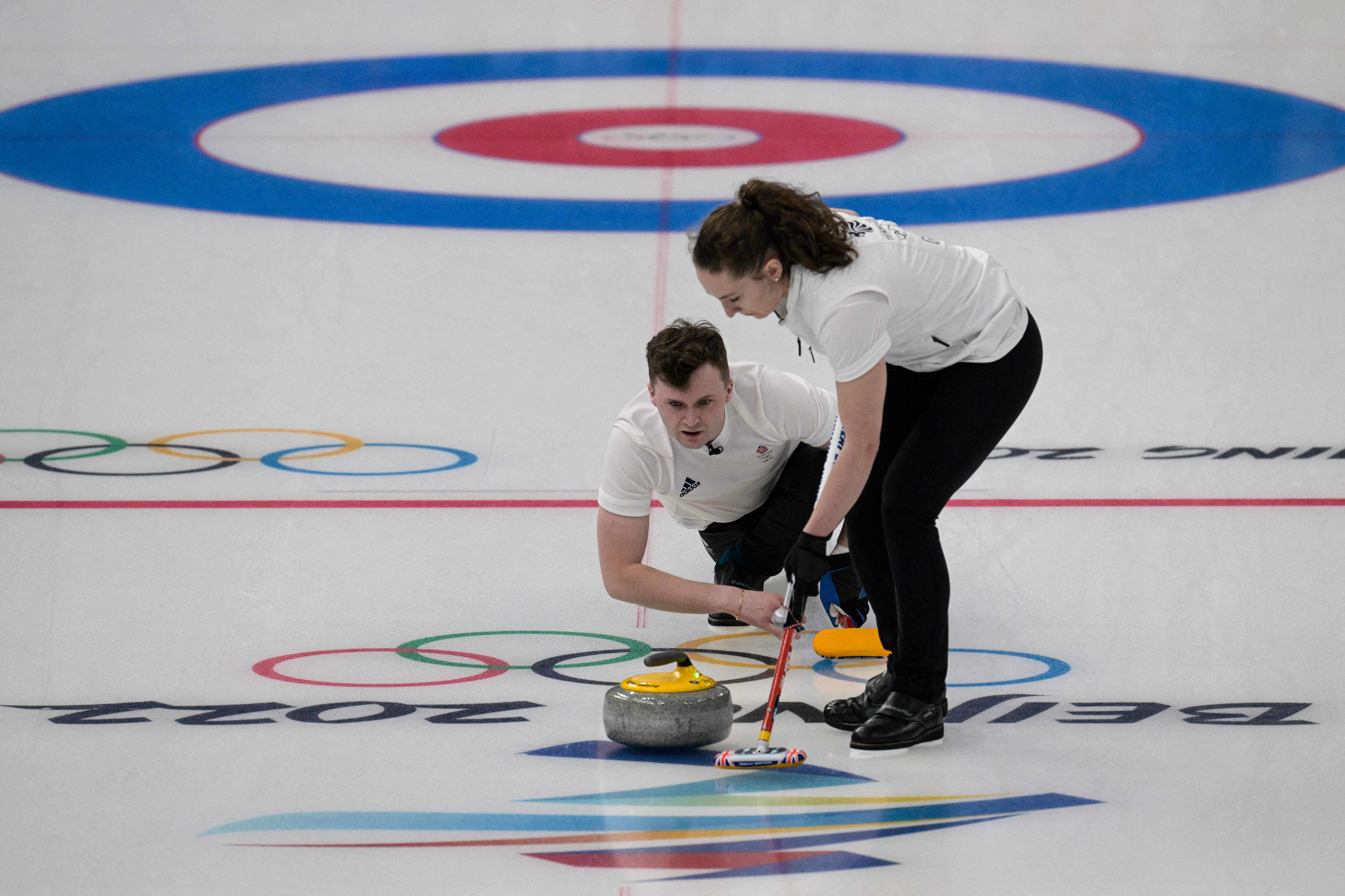 Bruce Mouat and Jennifer Dodds compete at the Ice Cube in Beijing