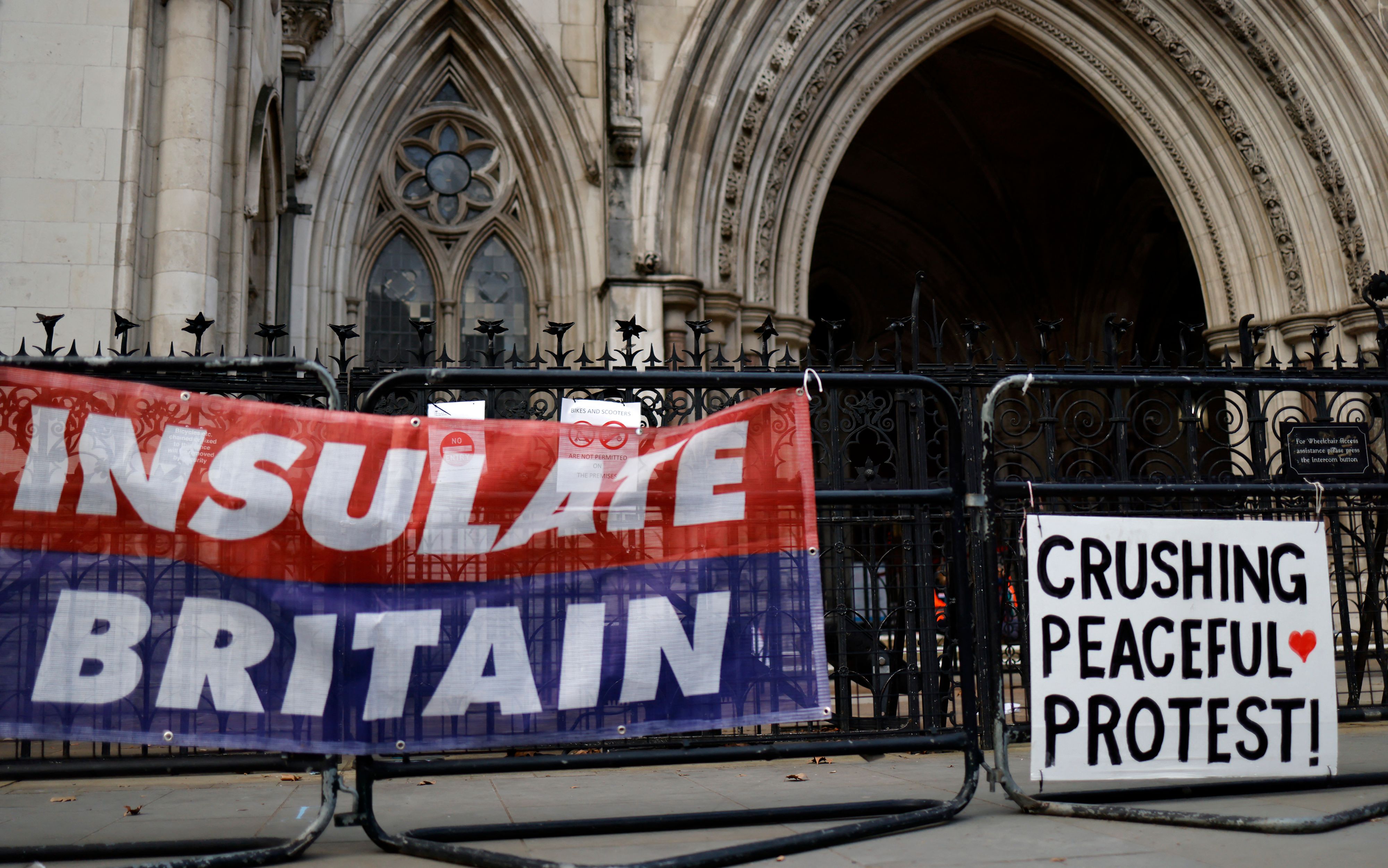 <p>An Insulate Britain banner outside the Royal Courts of Justice  </p>