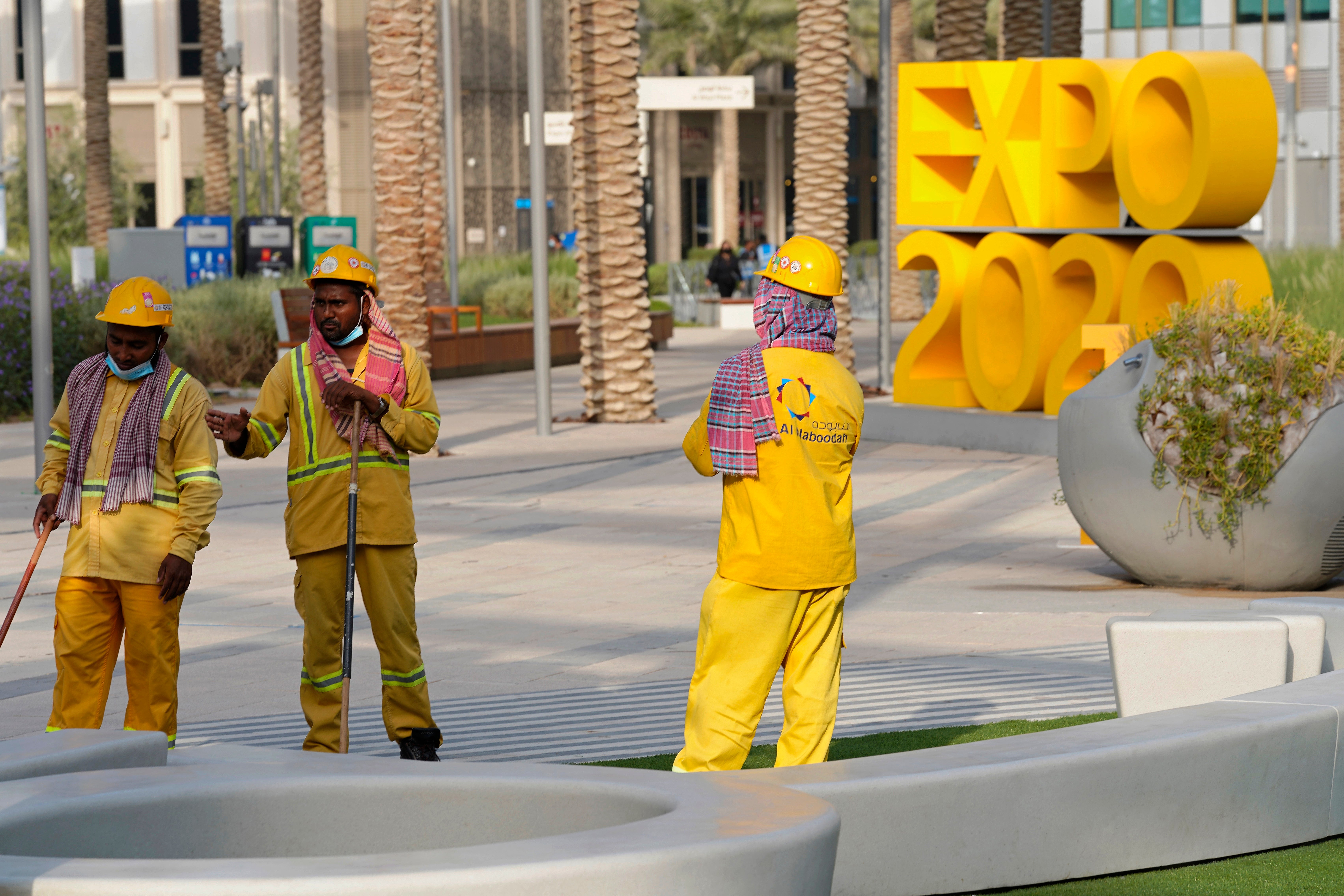 Cleaners work at Expo 2020 in Dubai, United Arab Emirates, on 3 October, 2021.