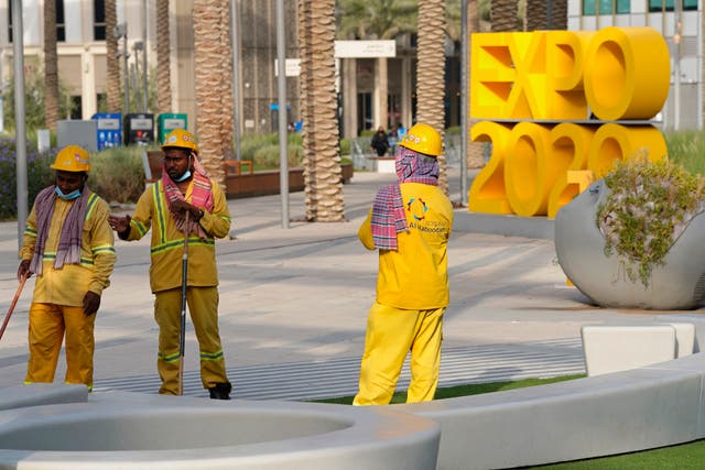 <p>Cleaners work at Expo 2020 in Dubai, United Arab Emirates, on 3 October, 2021.</p>