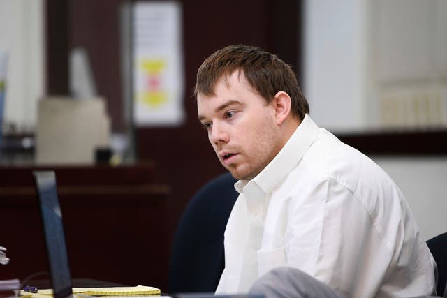 <p>Travis Reinking in court during his murder trial </p>
