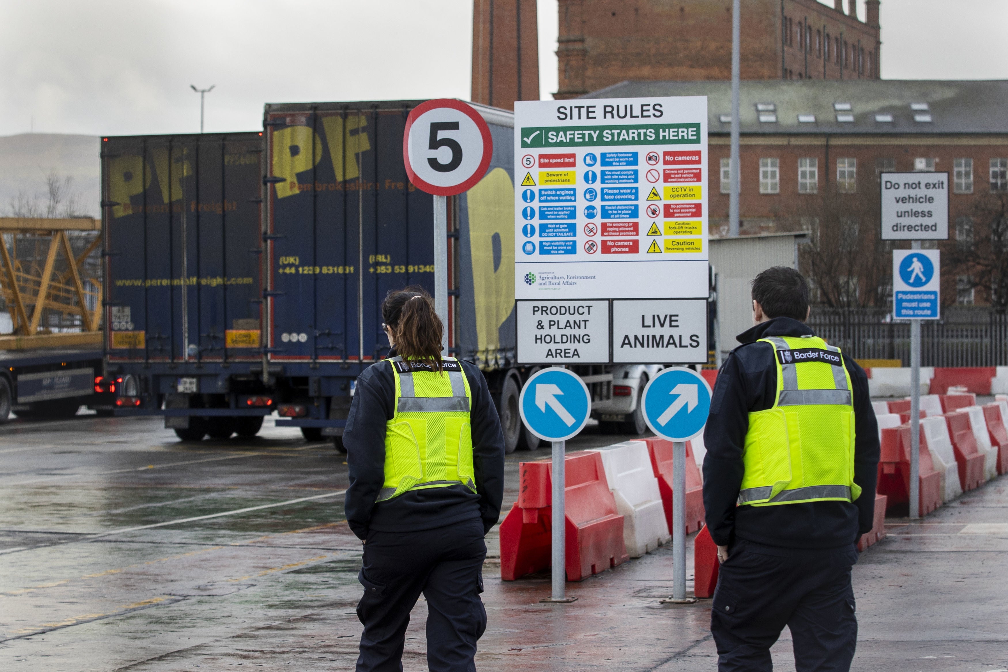 UK Border Force officers at the NI Department of Agriculture, Environment and Rural Affairs Northern Ireland Point of Entry site on Milewater Road in Belfast at the Port of Belfast (Liam McBurney/PA)