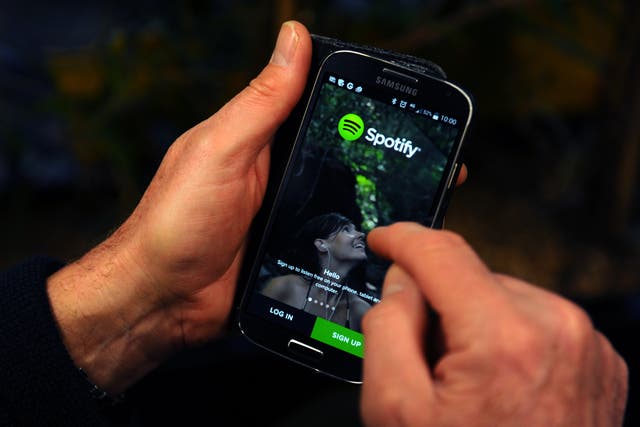 The Spotify App is shown on a Samsung smartphone (Lauren Hurley/PA)