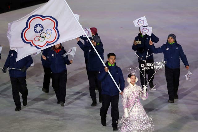 <p>File photo: Taiwanese athletes carry flags during the opening ceremony of the 2018 Winter Olympics in Pyeongchang, South Korea, 9 February 2018</p>