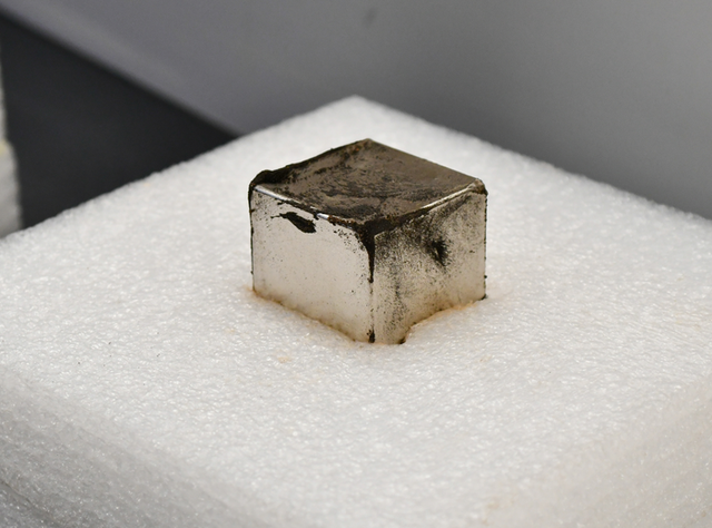 <p>Magnet holds tiny micrometeorites collected from sediment samples taken from an ancient Hopewell site</p>