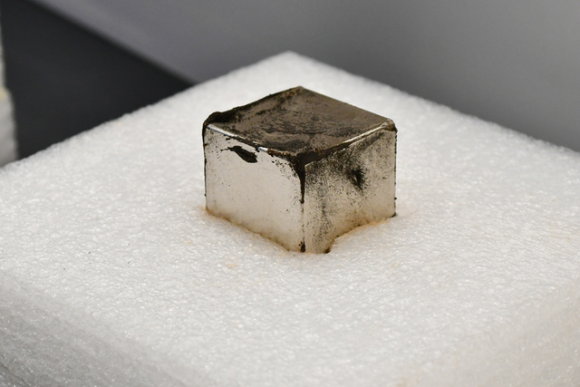 <p>Magnet holds tiny micrometeorites collected from sediment samples taken from an ancient Hopewell site</p>