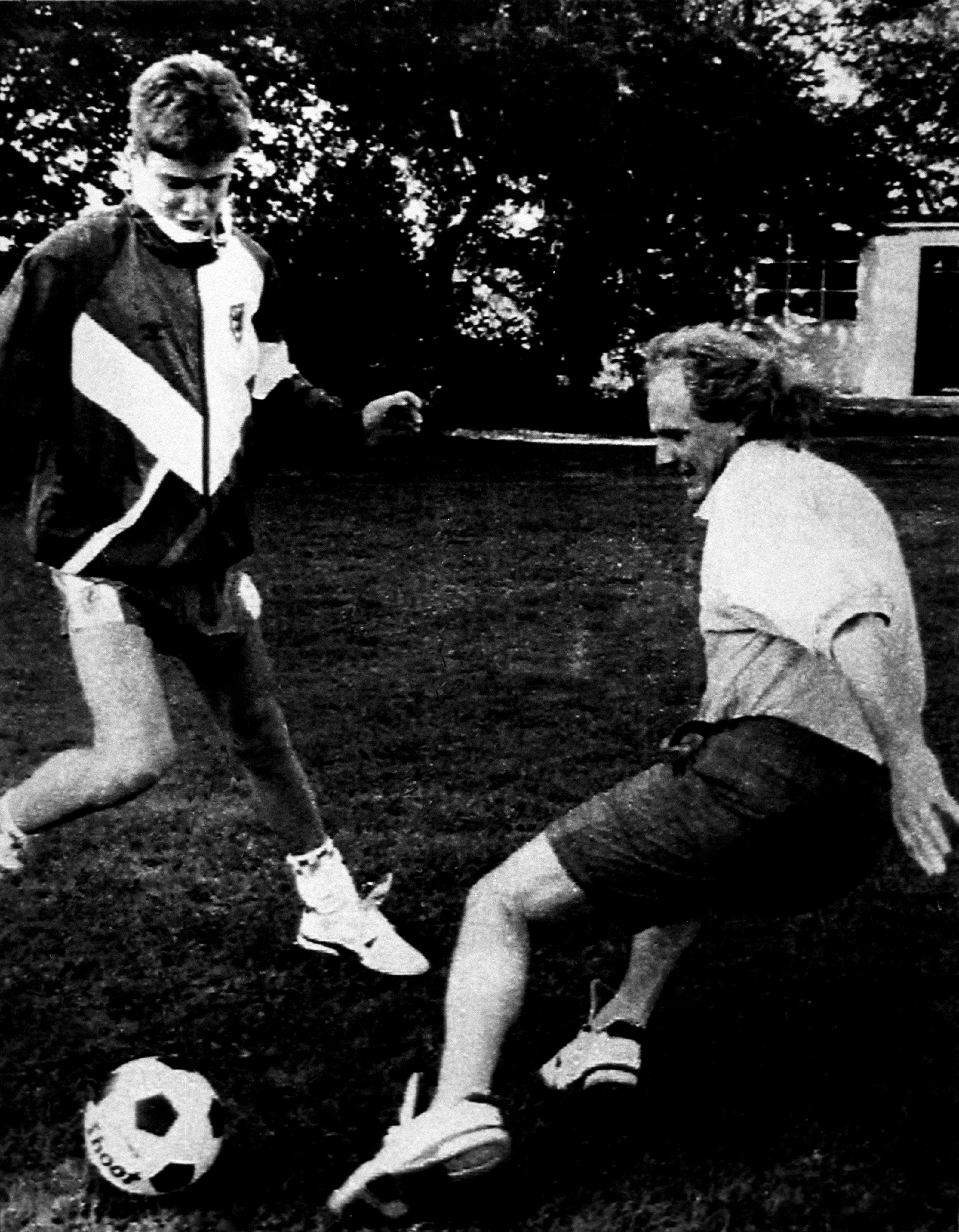 Terry Yorath playing football with his son Daniel (handout/PA)