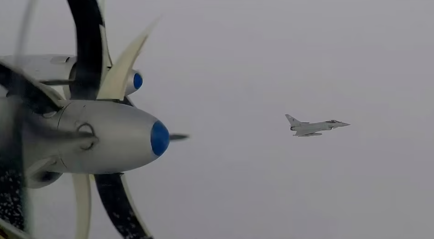 Two Russian Tu-95 Bear H bombers and two maritime patrol Tu-142 Bear F aircraft involved in mid-air standoff
