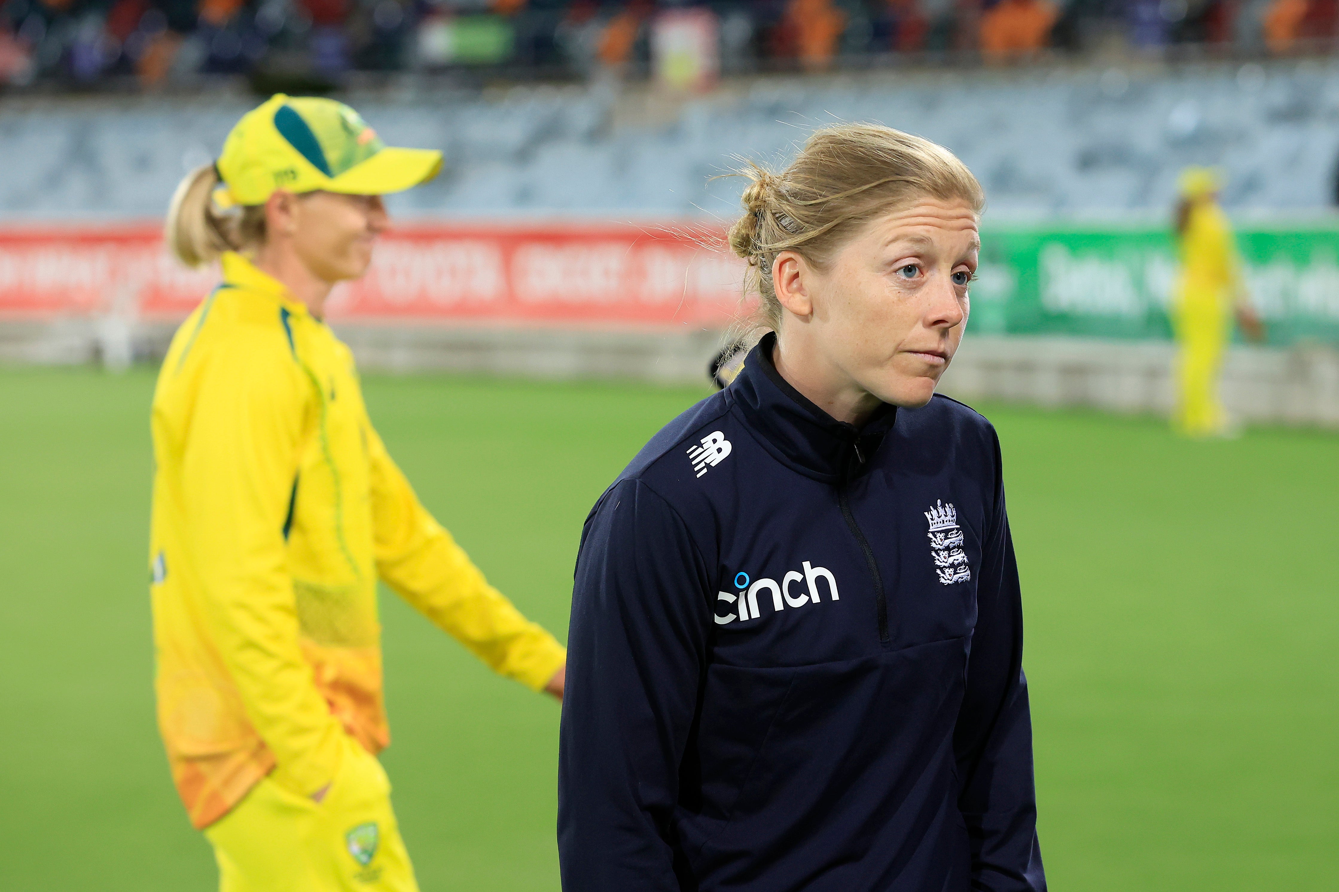 Heather Knight talks to the media after defeat to Australia