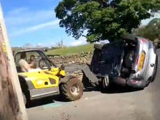 Farmer who used tractor to flip car parked on driveway tells jury ‘an Englishman’s home is his castle’