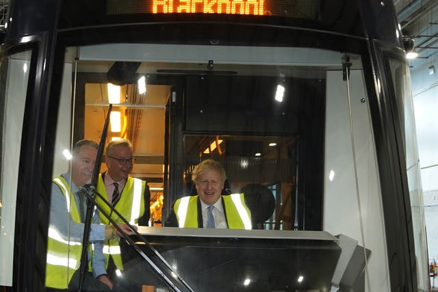 <p>Boris Johnson and Michael Gove in the driver’s cab of a tram during a visit to Blackpool Transport Depot on Thursday </p>